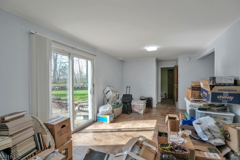 14 Woods Edge Road Stanhope, NJ 07874 - Photo 21 of 25 a view of a dining room with furniture window and outside view