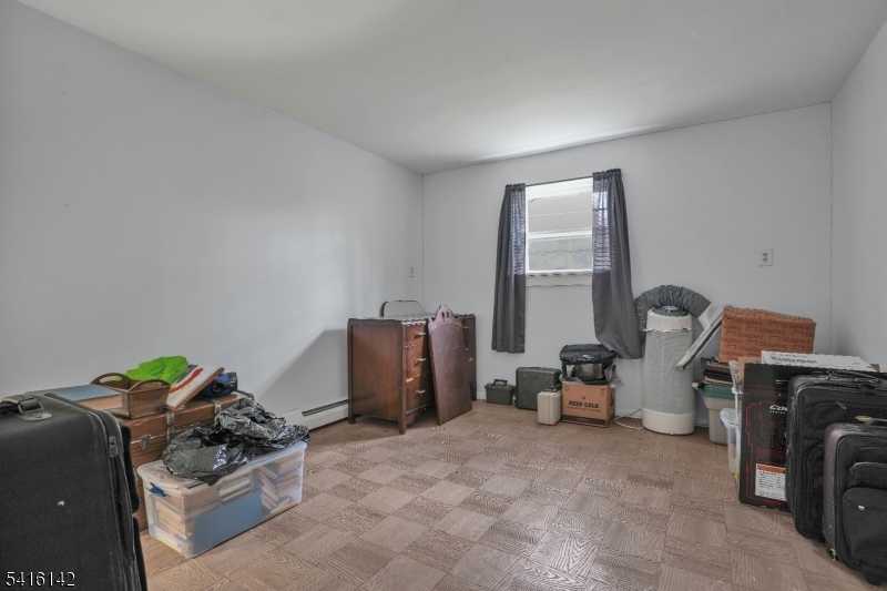 14 Woods Edge Road Stanhope, NJ 07874 - Photo 22 of 25 a room with a window and gym equipment