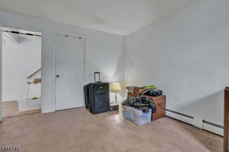 14 Woods Edge Road Stanhope, NJ 07874 - Photo 23 of 25 a room with cabinets and dust bin