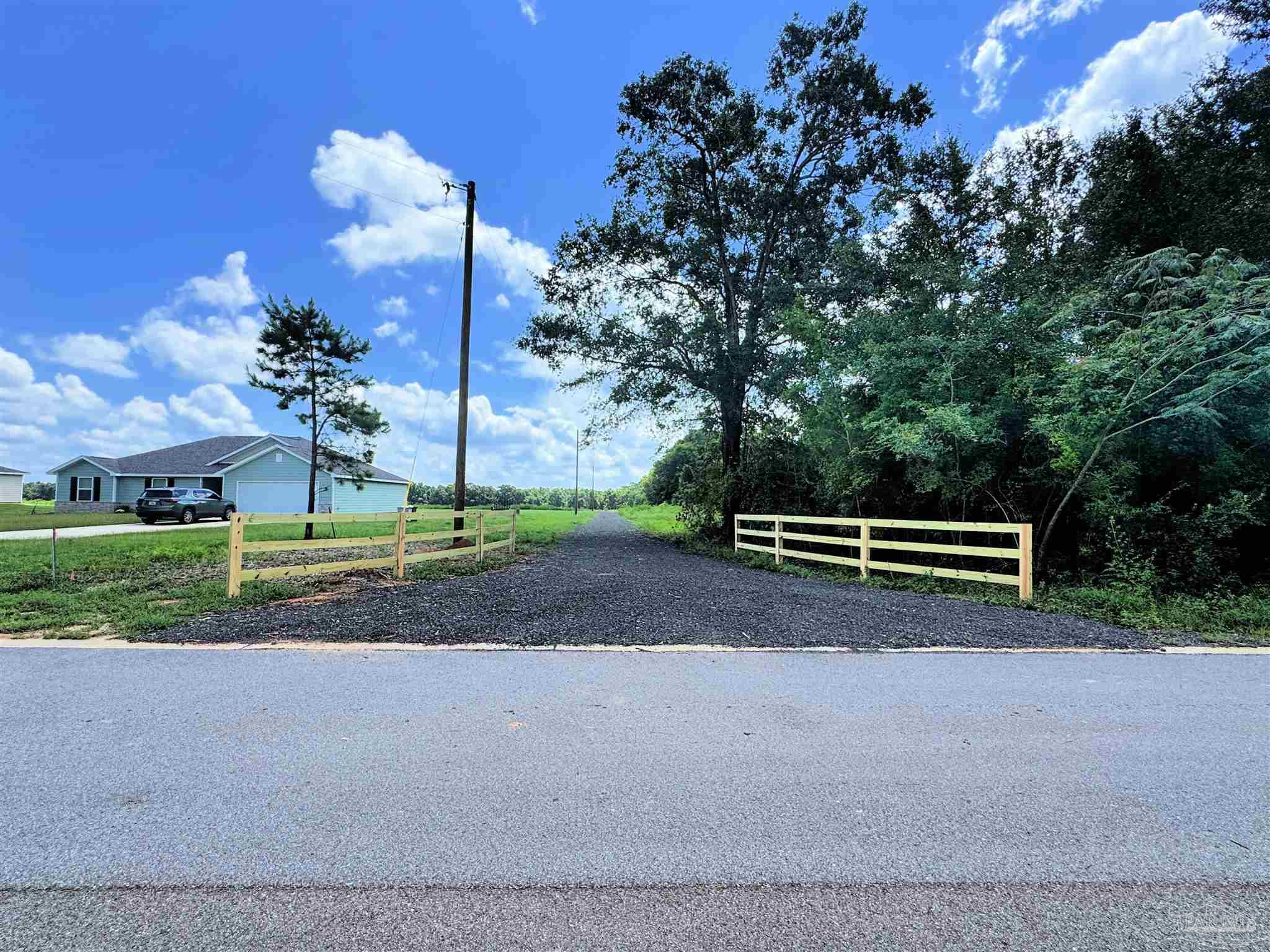 Lot 2 Three Hollow Road Jay, FL 32565 - Photo 6 of 16 a view of a house with a yard