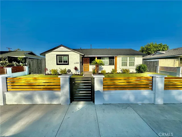 a view of a swimming pool with an outdoor seating