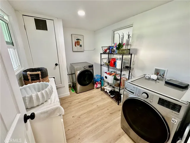 a view of livingroom with washer and dryer