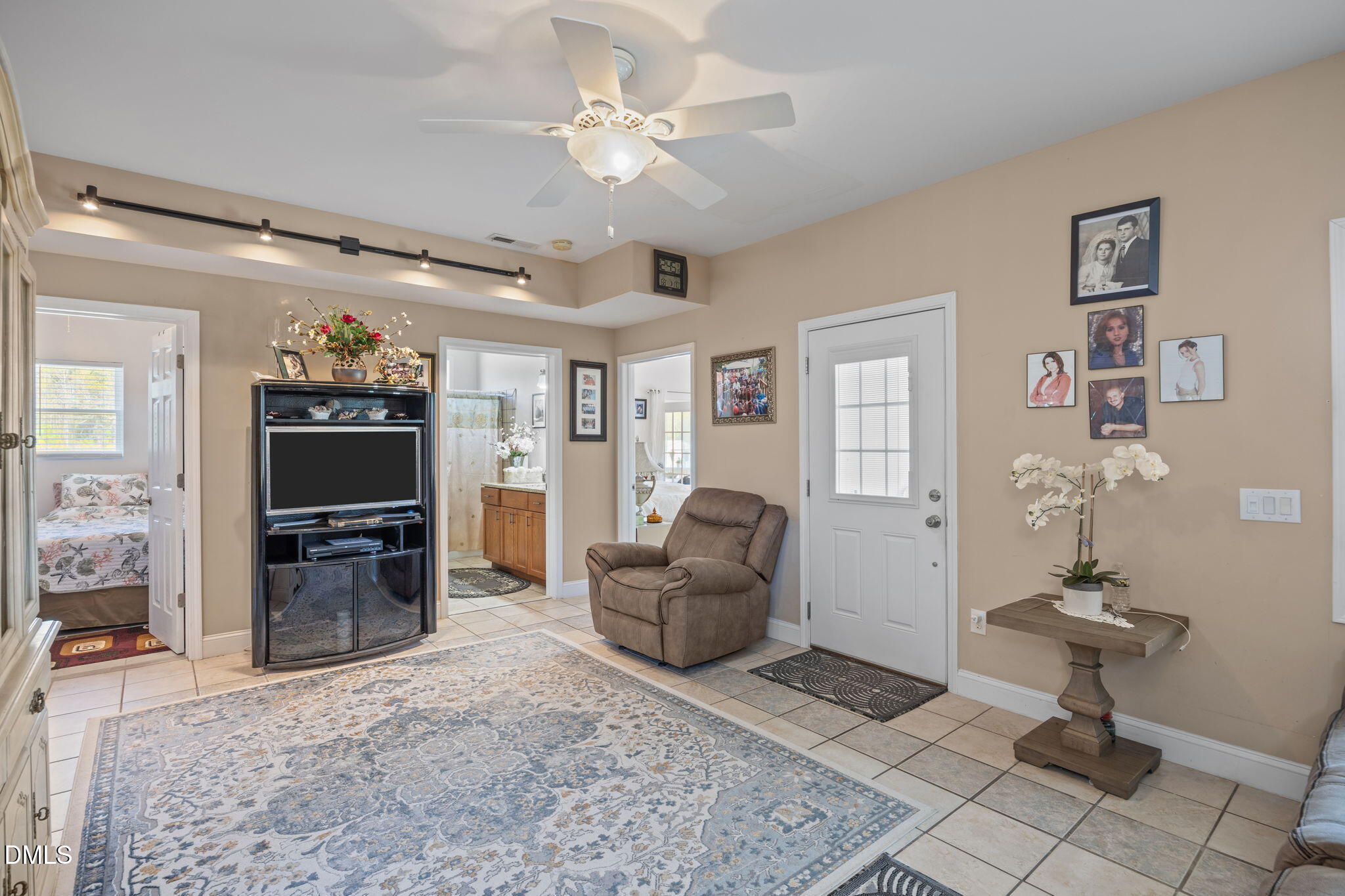 828 Chair Factory Road Nakina, NC 28455 - Photo 15 of 54 a living room with furniture and a flat screen tv