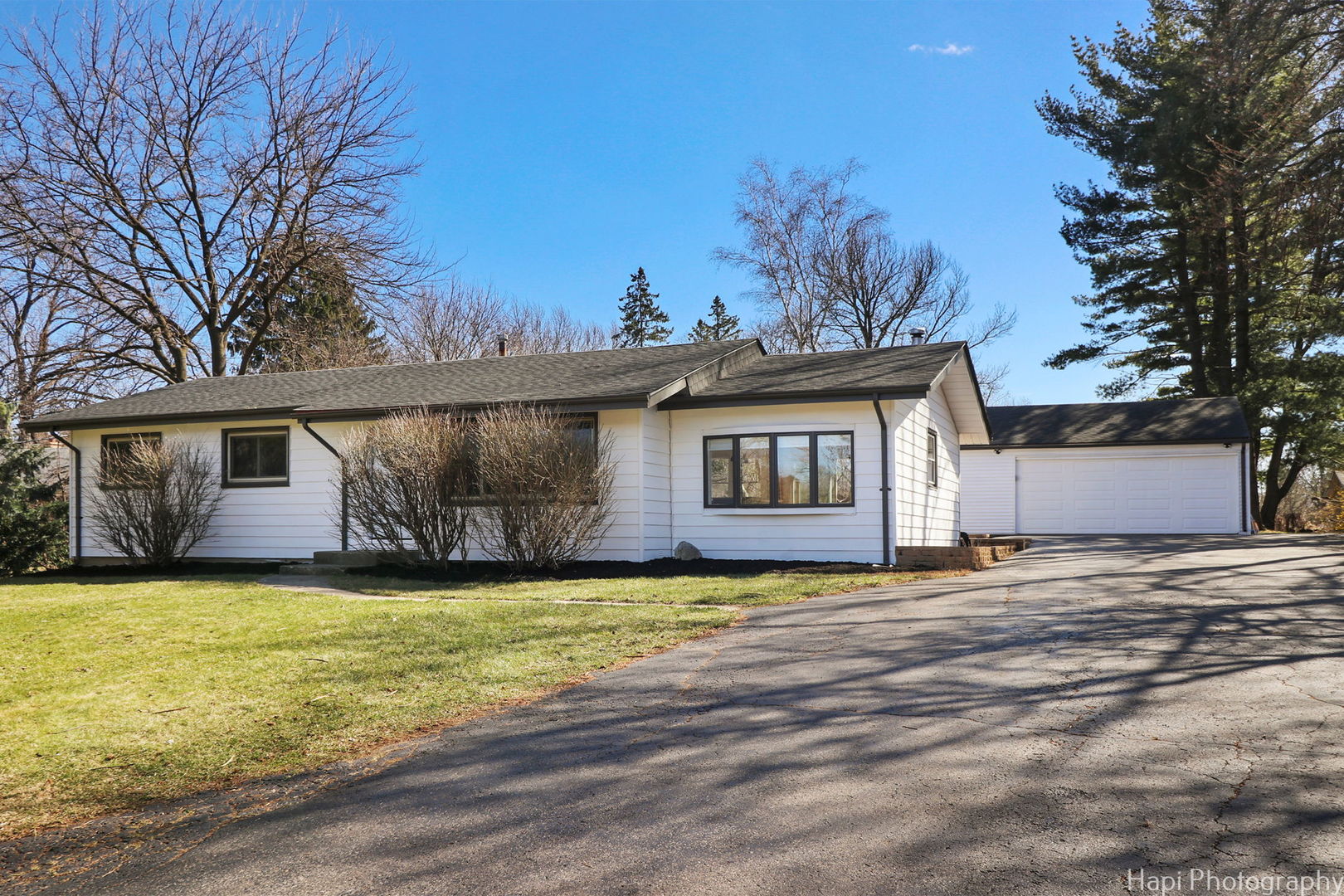 2217 Palatine Road Inverness, IL 60067 - Photo 1 of 28 a view of a house with a big yard