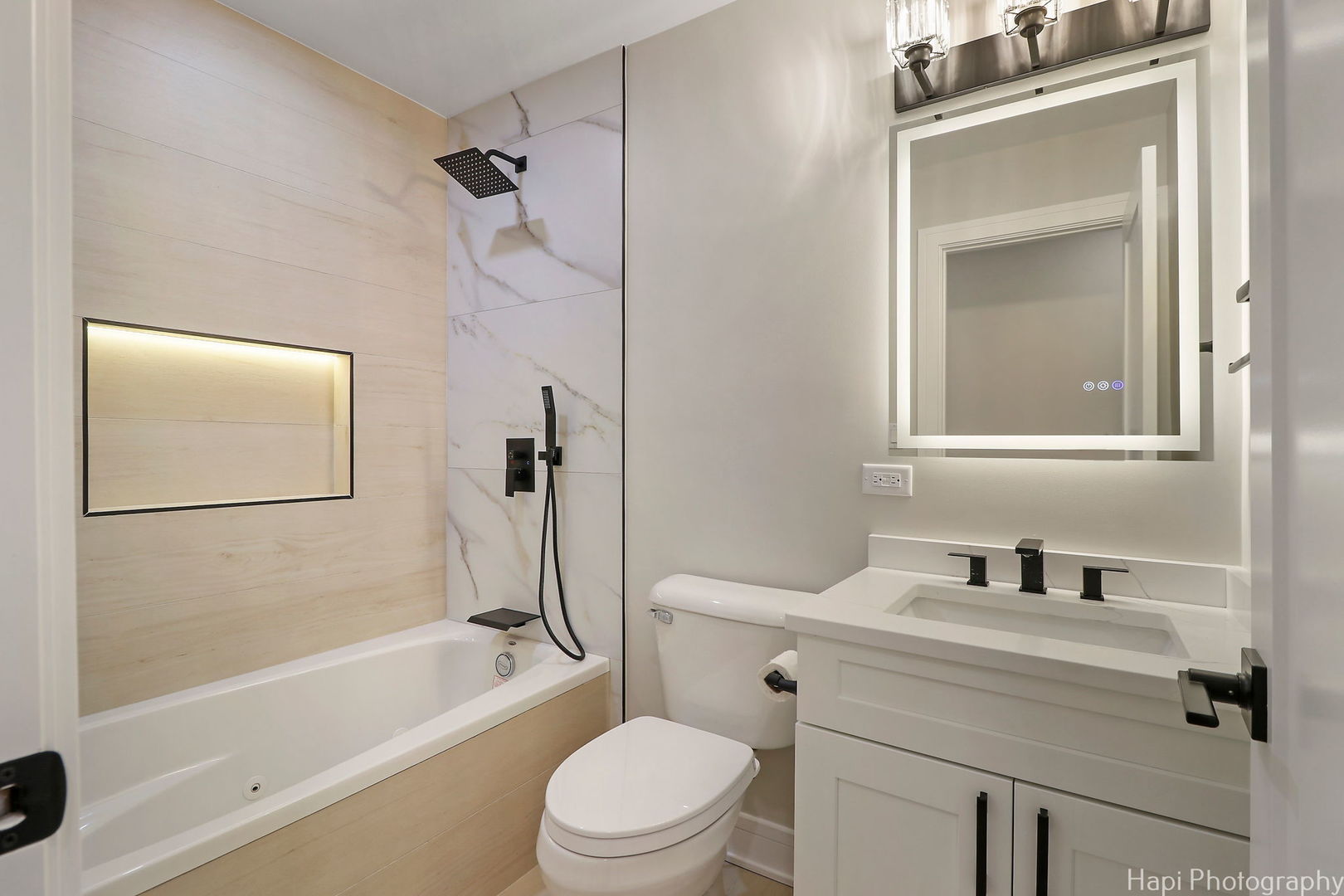 2217 Palatine Road Inverness, IL 60067 - Photo 11 of 28 a bathroom with a sink toilet and a bathtub