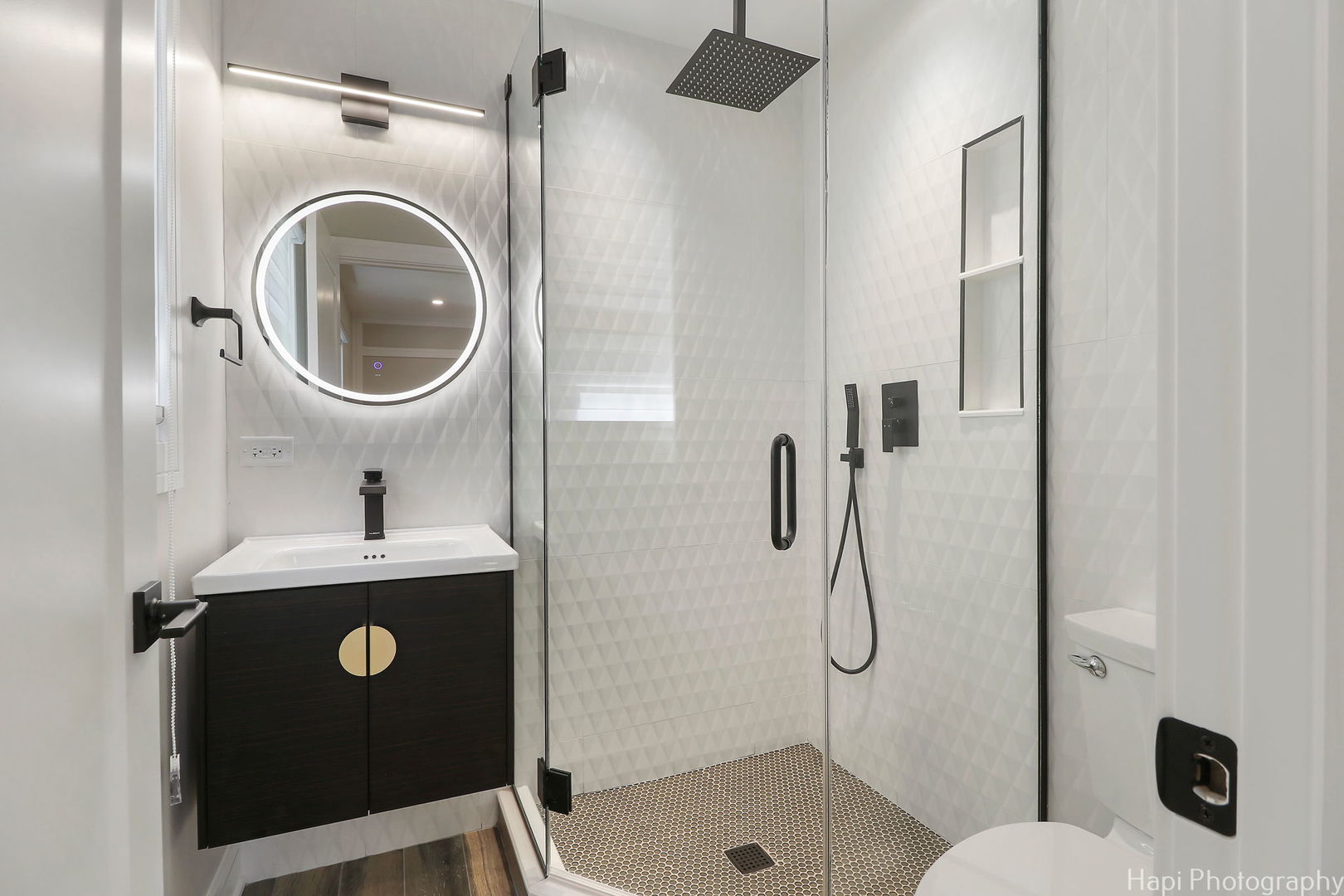 2217 Palatine Road Inverness, IL 60067 - Photo 13 of 28 a bathroom with a sink a toilet and shower