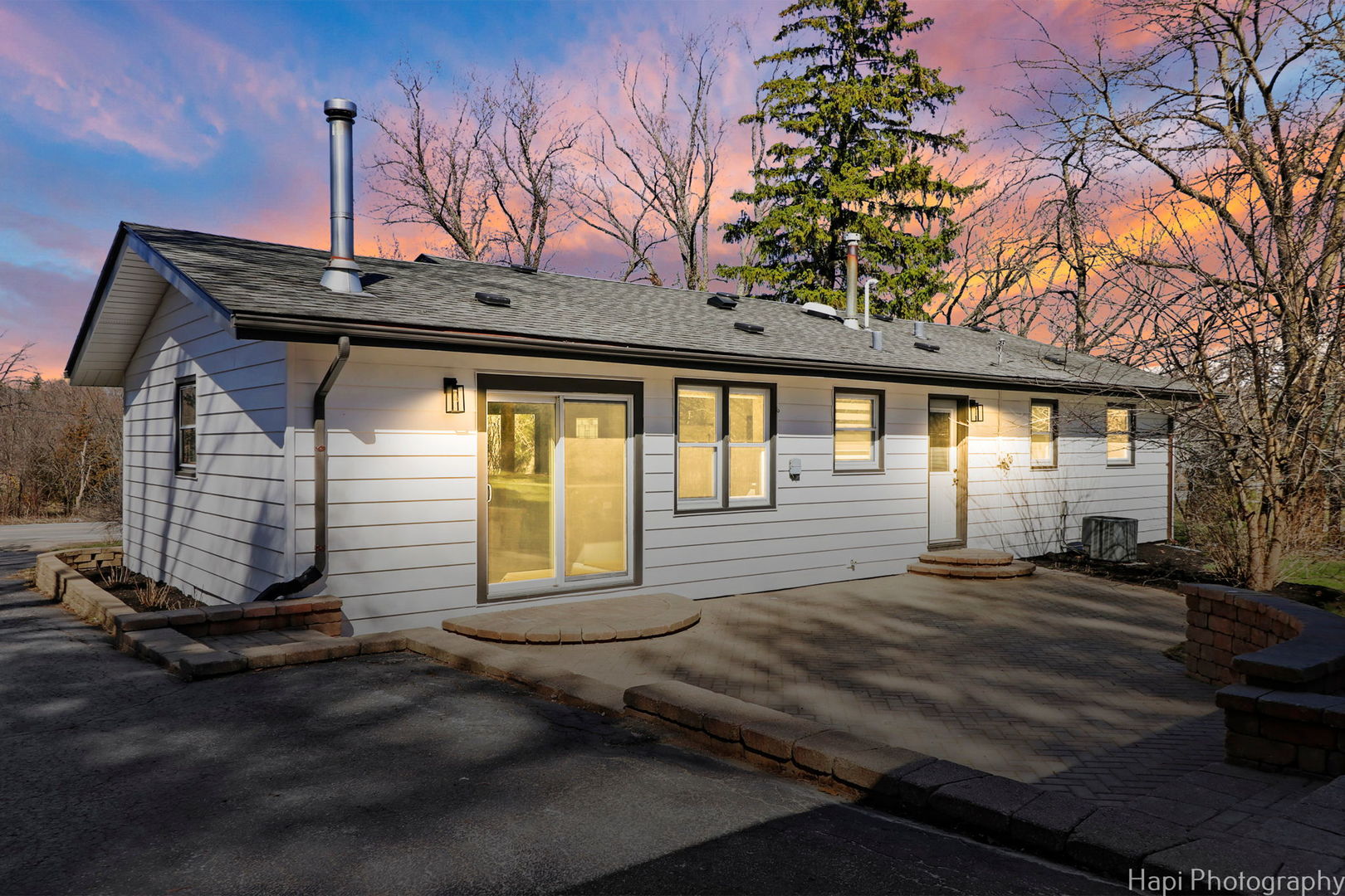 2217 Palatine Road Inverness, IL 60067 - Photo 19 of 28 a front view of a house with a yard