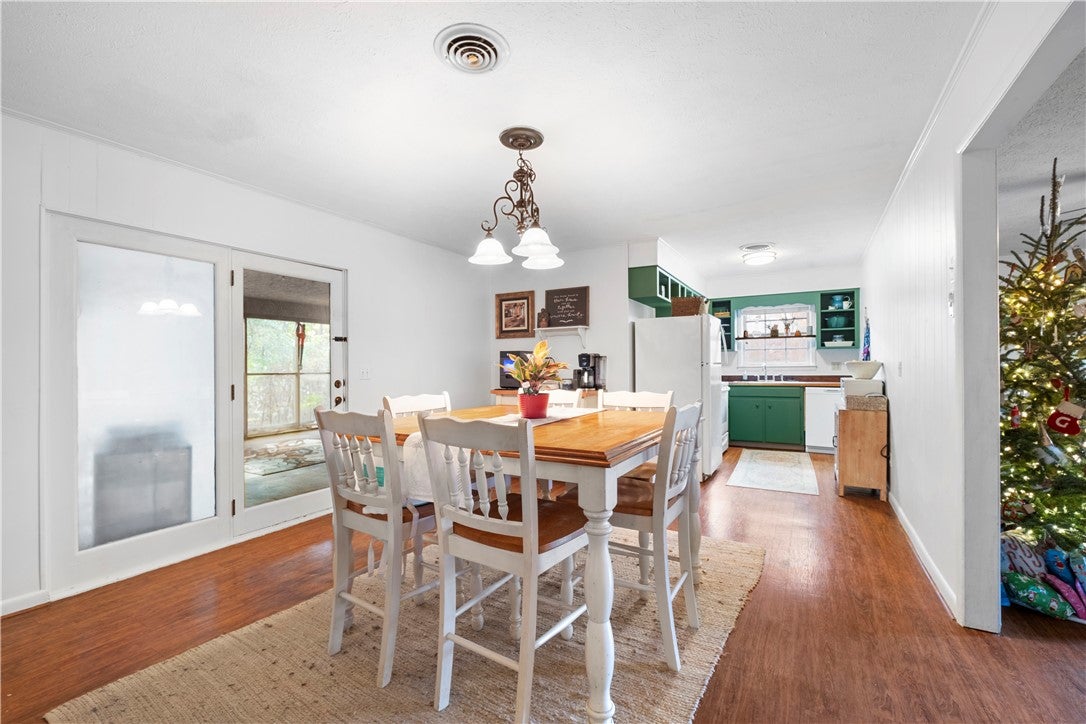 1112 Stage Road Auburn, AL 36830 - Photo 7 of 23 Kitchen is open to the living and comfortably holds a large dining table