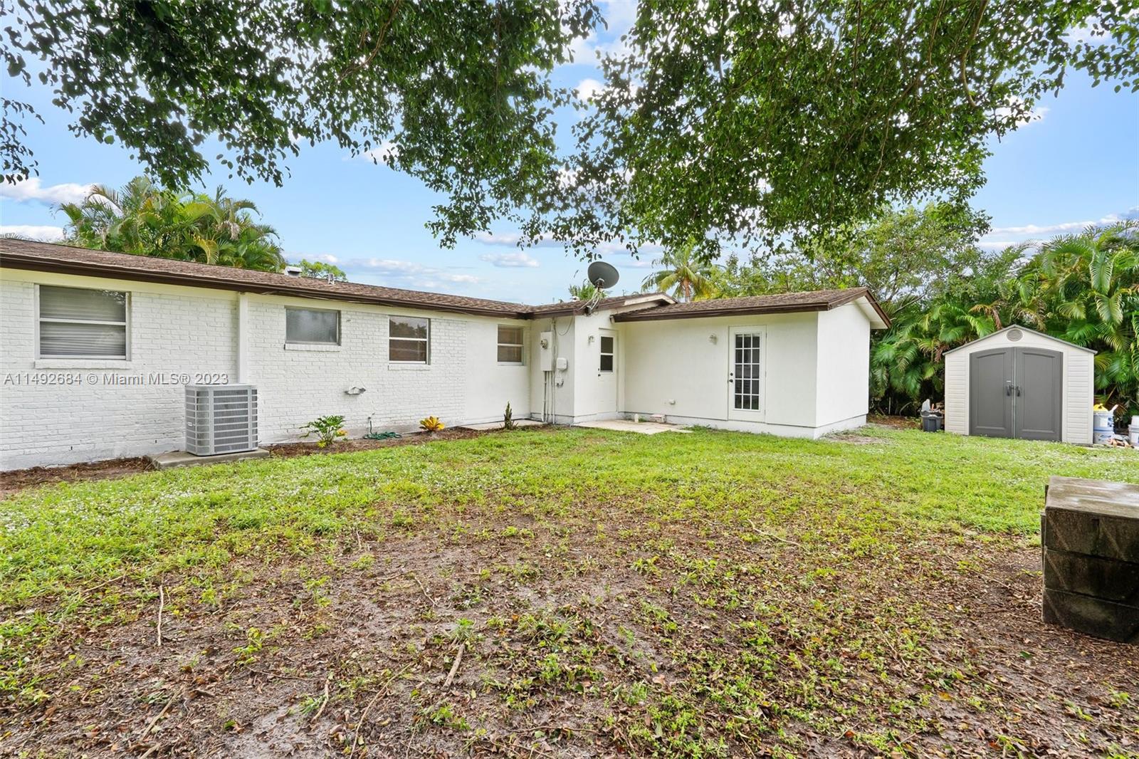 5893 Williamson Road Jupiter, FL 33458 - Photo 26 of 31 a house view with a garden space