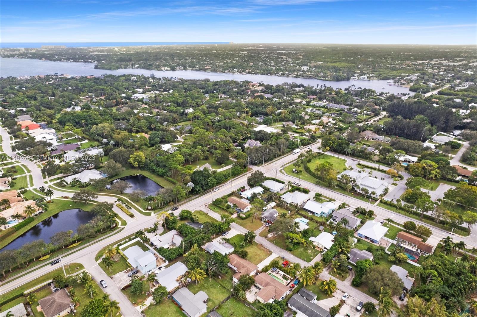 5893 Williamson Road Jupiter, FL 33458 - Photo 30 of 31 an aerial view of residential houses with city view