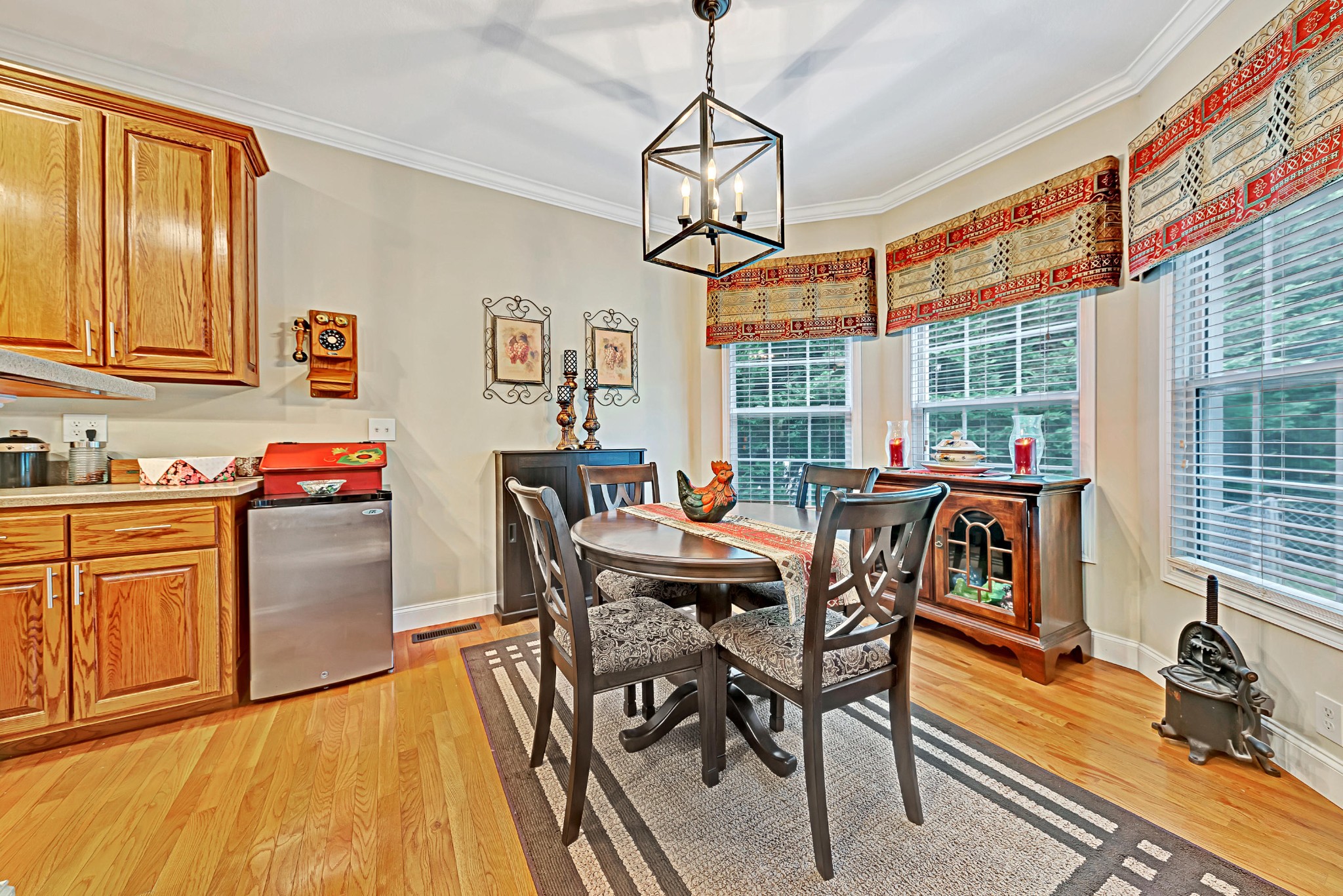 716 Ridgeview Drive Clinton, TN 37716 - Photo 4 of 23 a dining room with furniture a chandelier and wooden floor