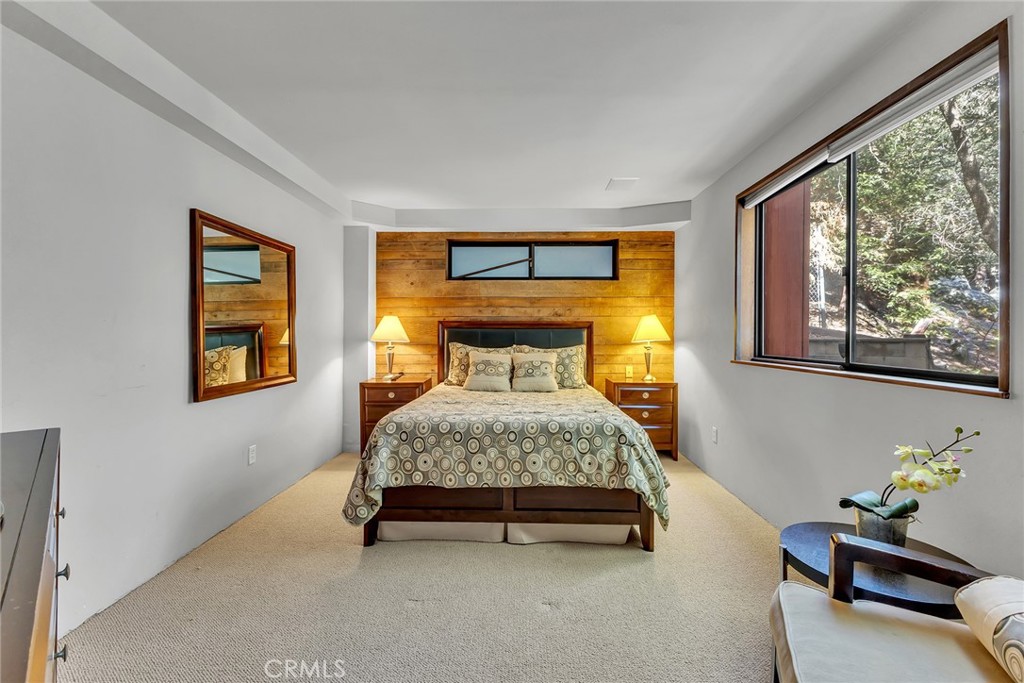 53580 Jeffery Pine Road Idyllwild, CA 92549 - Photo 25 of 61 a bedroom with a bed and a window