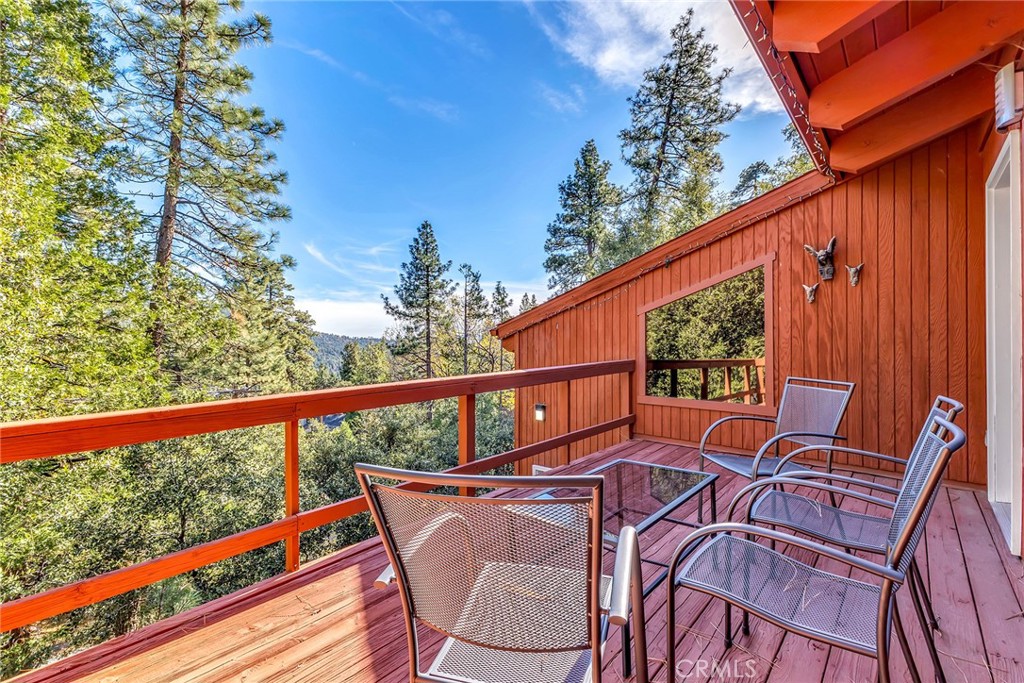 53580 Jeffery Pine Road Idyllwild, CA 92549 - Photo 47 of 61 a balcony view with couple of chairs