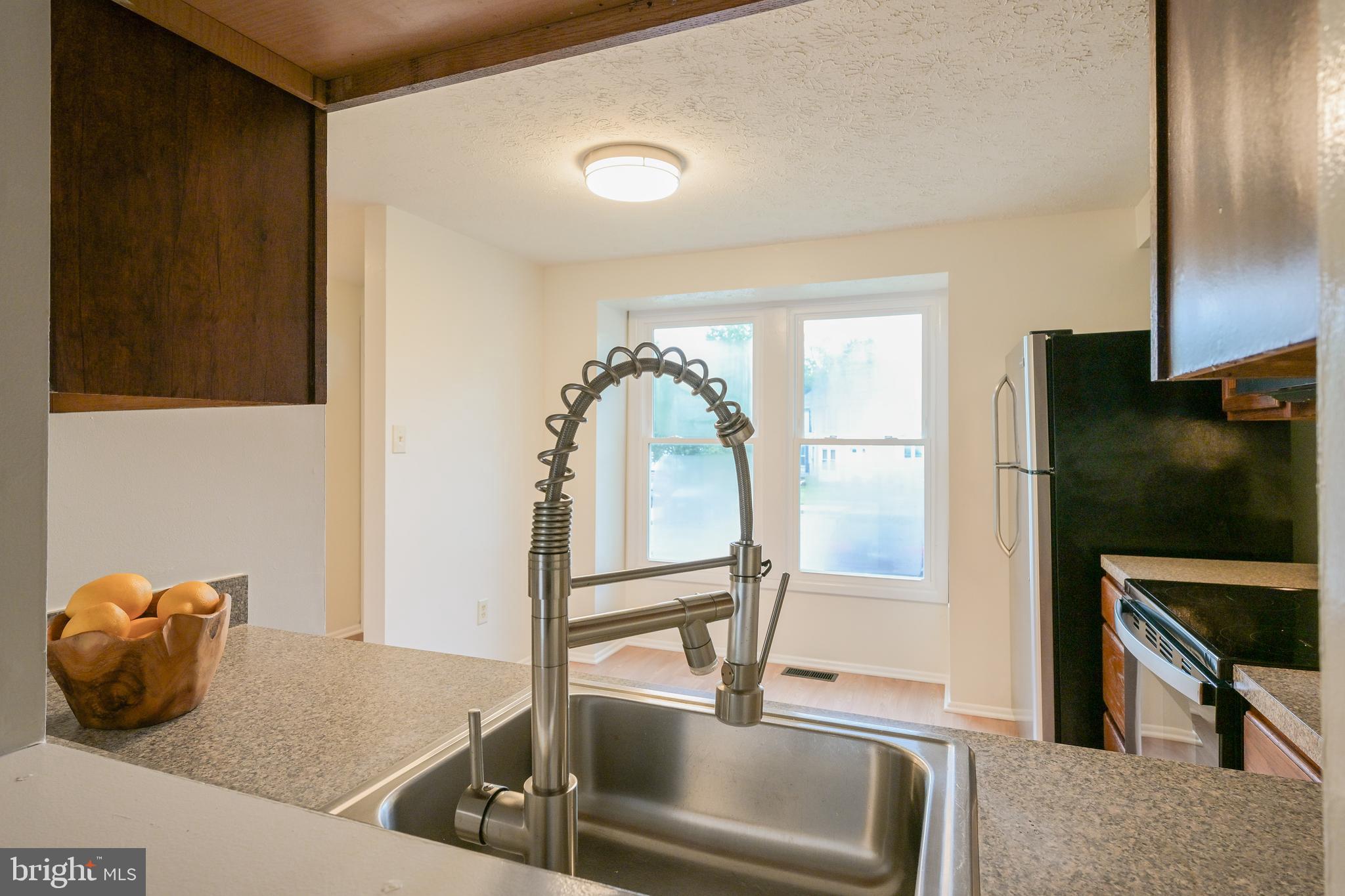 7954 Millstream Court Elkridge, MD 21075 - Photo 13 of 41 a view of a living room and bathroom