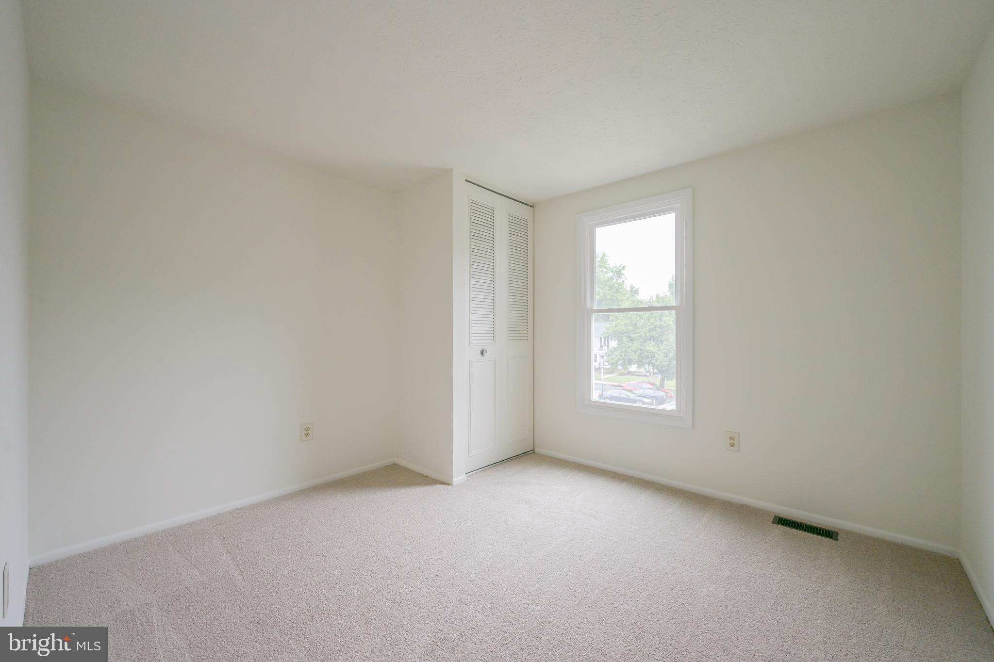 7954 Millstream Court Elkridge, MD 21075 - Photo 23 of 41 a view of empty room with window