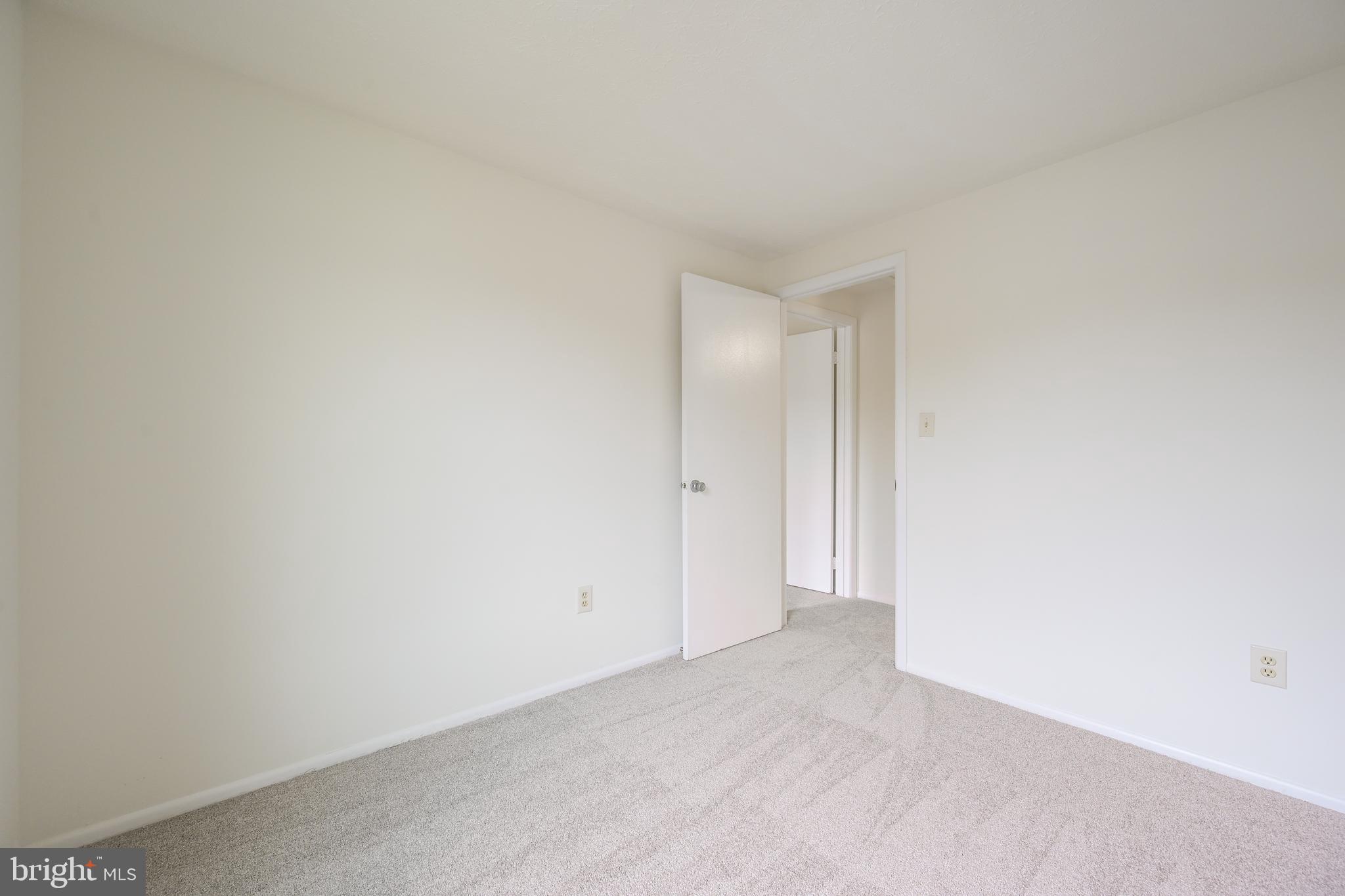 7954 Millstream Court Elkridge, MD 21075 - Photo 24 of 41 a view of an empty room