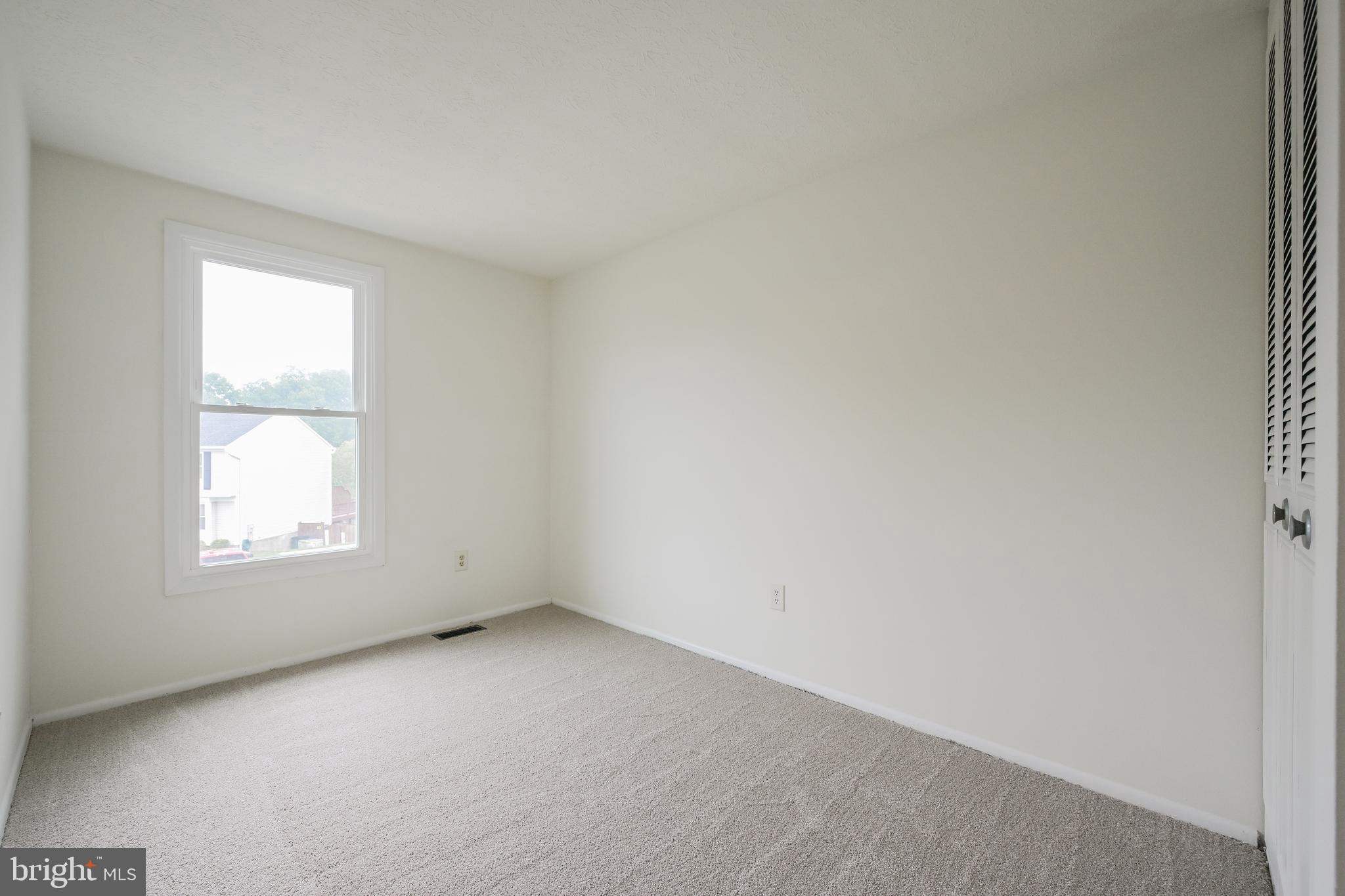 7954 Millstream Court Elkridge, MD 21075 - Photo 25 of 41 an empty room with a window