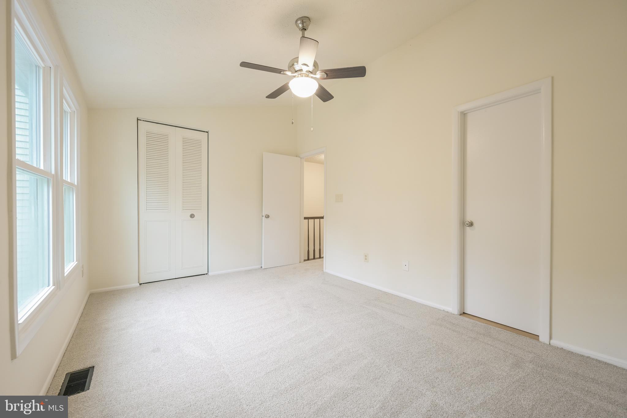 7954 Millstream Court Elkridge, MD 21075 - Photo 30 of 41 a view of an empty room with a window