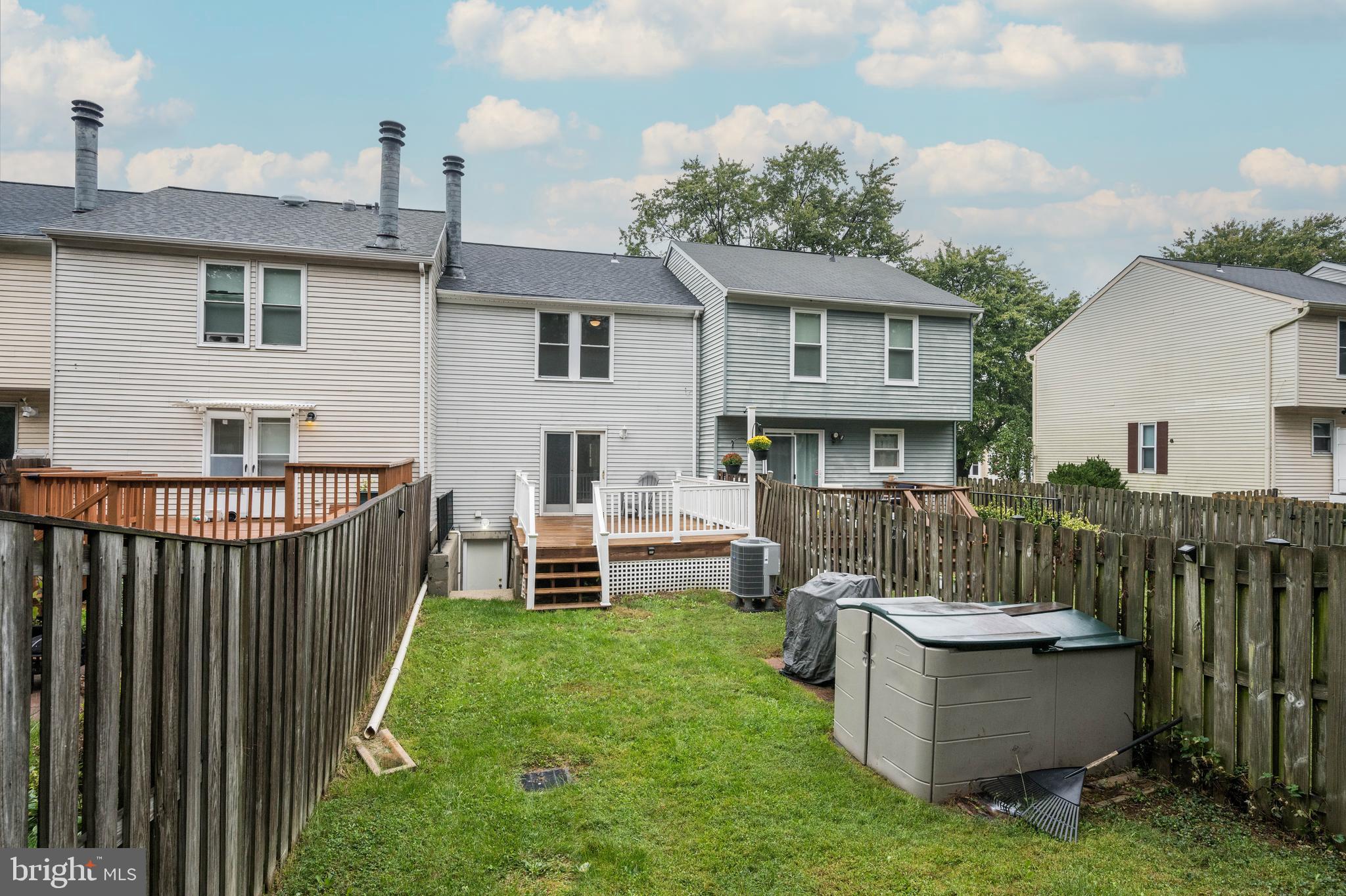 7954 Millstream Court Elkridge, MD 21075 - Photo 5 of 41 a view of a house with backyard and sitting area