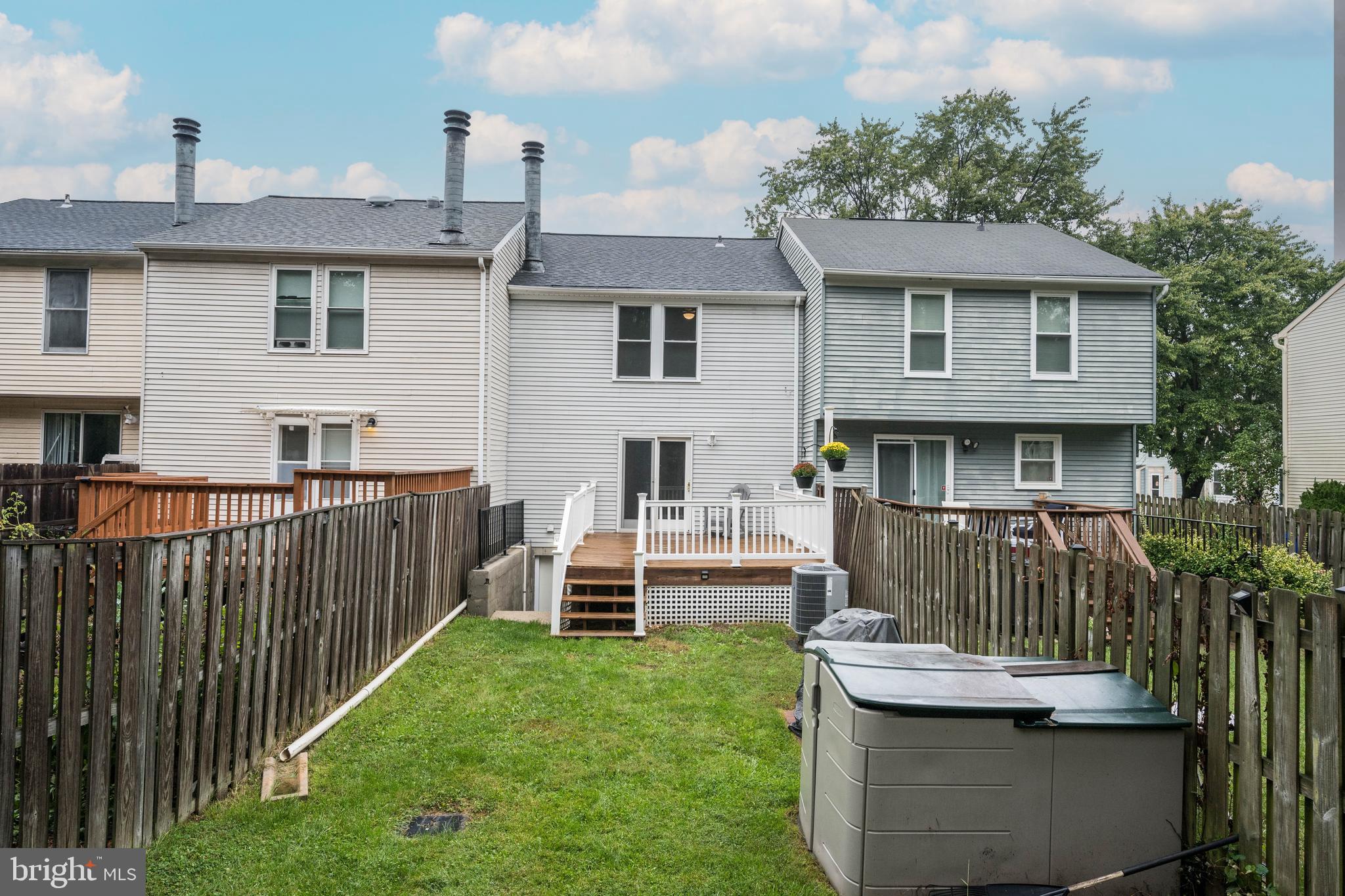7954 Millstream Court Elkridge, MD 21075 - Photo 6 of 41 a view of a house with backyard and sitting area