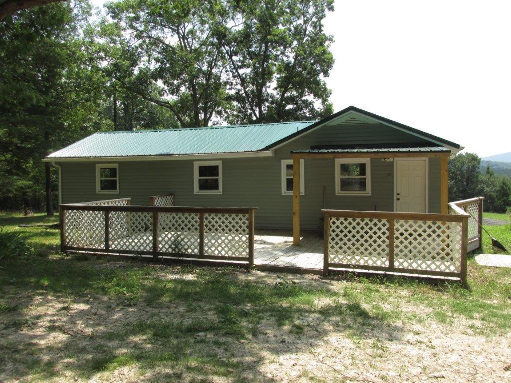 3779 Flatwoods Road Elliston, VA 24087 - Photo 17 of 21 a front view of a house with a yard