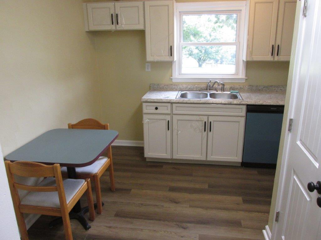 3779 Flatwoods Road Elliston, VA 24087 - Photo 4 of 21 a kitchen with a sink cabinets and a window