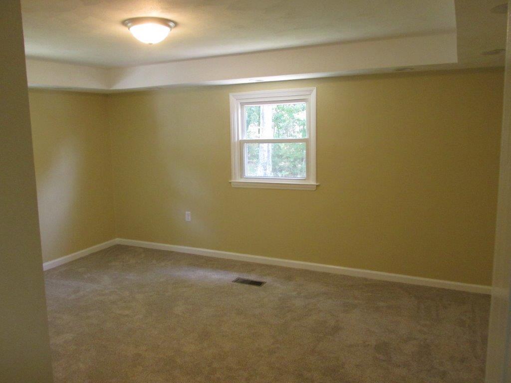 3779 Flatwoods Road Elliston, VA 24087 - Photo 8 of 21 an empty room with a window