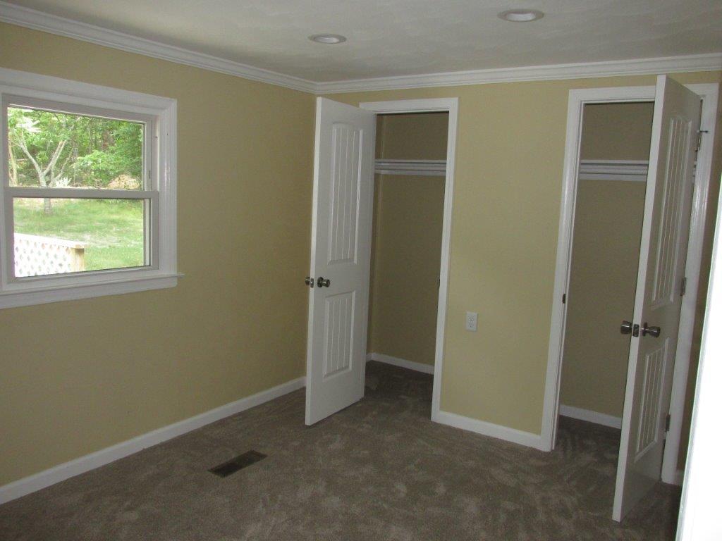 3779 Flatwoods Road Elliston, VA 24087 - Photo 9 of 21 an empty room with windows and closet