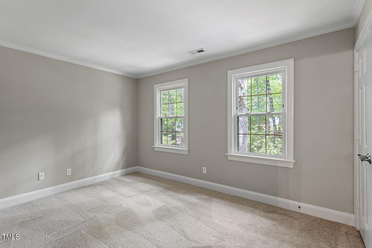 5200 Smallwood Court Raleigh, NC 27613 - Photo 22 of 38 Bedroom 3