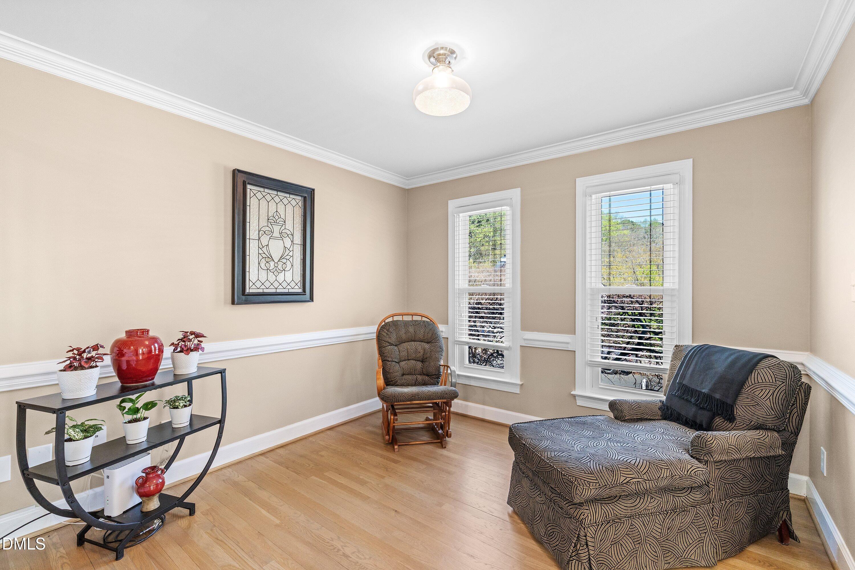 501 Samara Street Apex, NC 27502 - Photo 20 of 77 a living room with furniture and a window