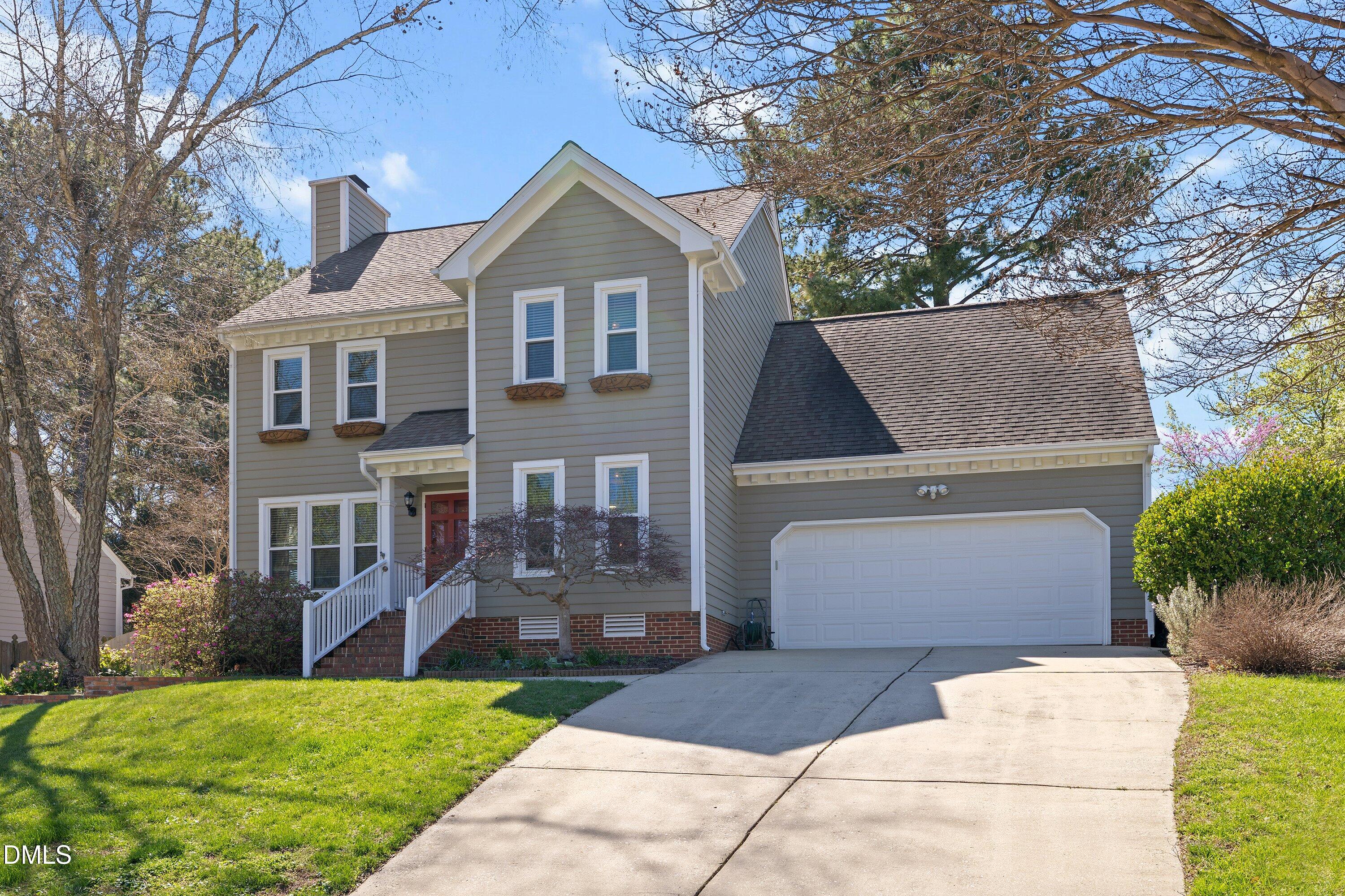 501 Samara Street Apex, NC 27502 - Photo 75 of 77 a front view of a house with a yard