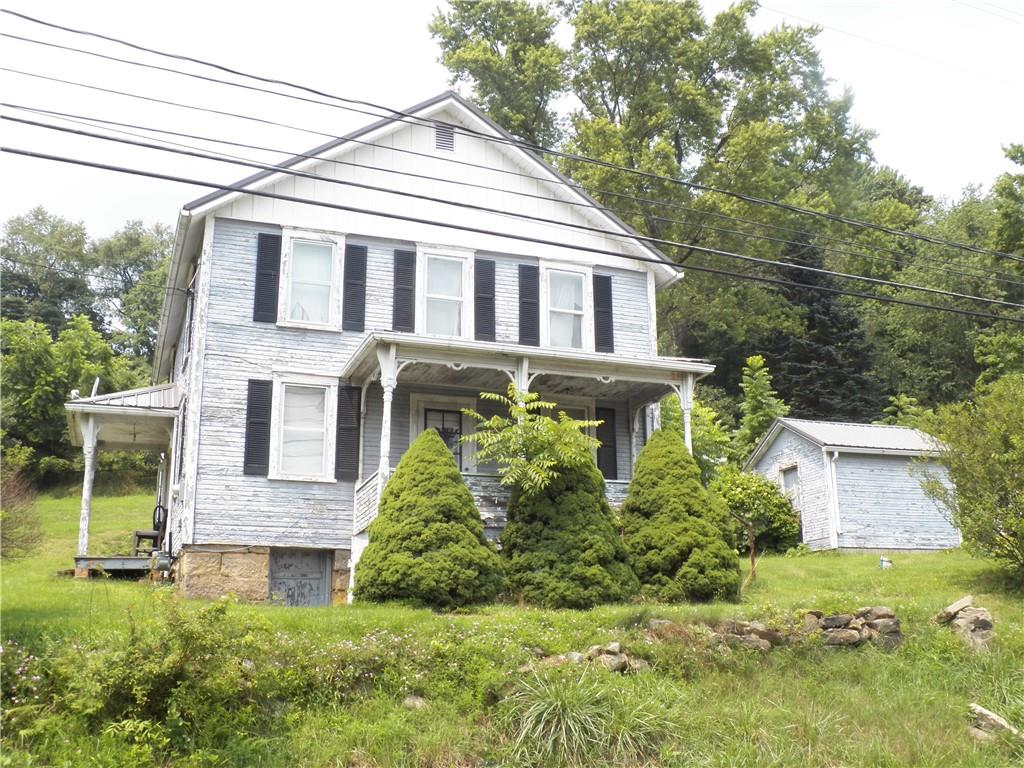 555 MADISON Road Templeton, PA 16259 - Photo 20 of 24 a aerial view of a house with a yard