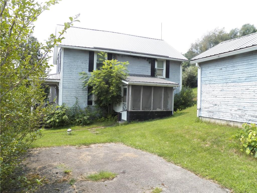 555 MADISON Road Templeton, PA 16259 - Photo 2 of 24 a view of a house with a yard