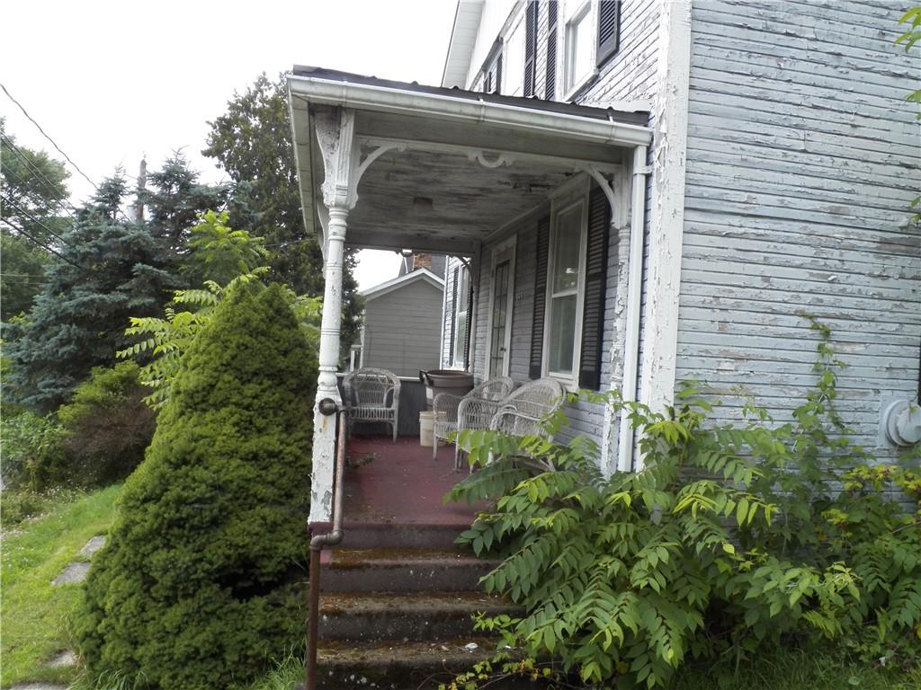 555 MADISON Road Templeton, PA 16259 - Photo 21 of 24 front view of a house with potted plants