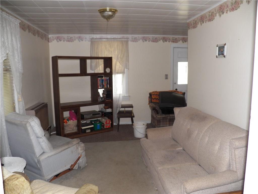 555 MADISON Road Templeton, PA 16259 - Photo 4 of 24 a living room with furniture and a flat screen tv