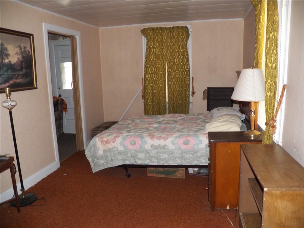 555 MADISON Road Templeton, PA 16259 - Photo 10 of 24 a bedroom with a bed and a flat tv screen on the table