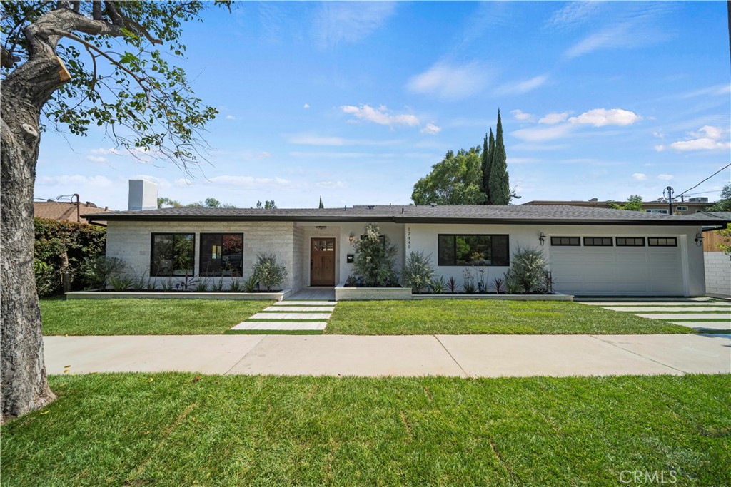12440 Addison Street Valley Village, CA 91607 - Photo 1 of 1 a front view of a house with a yard