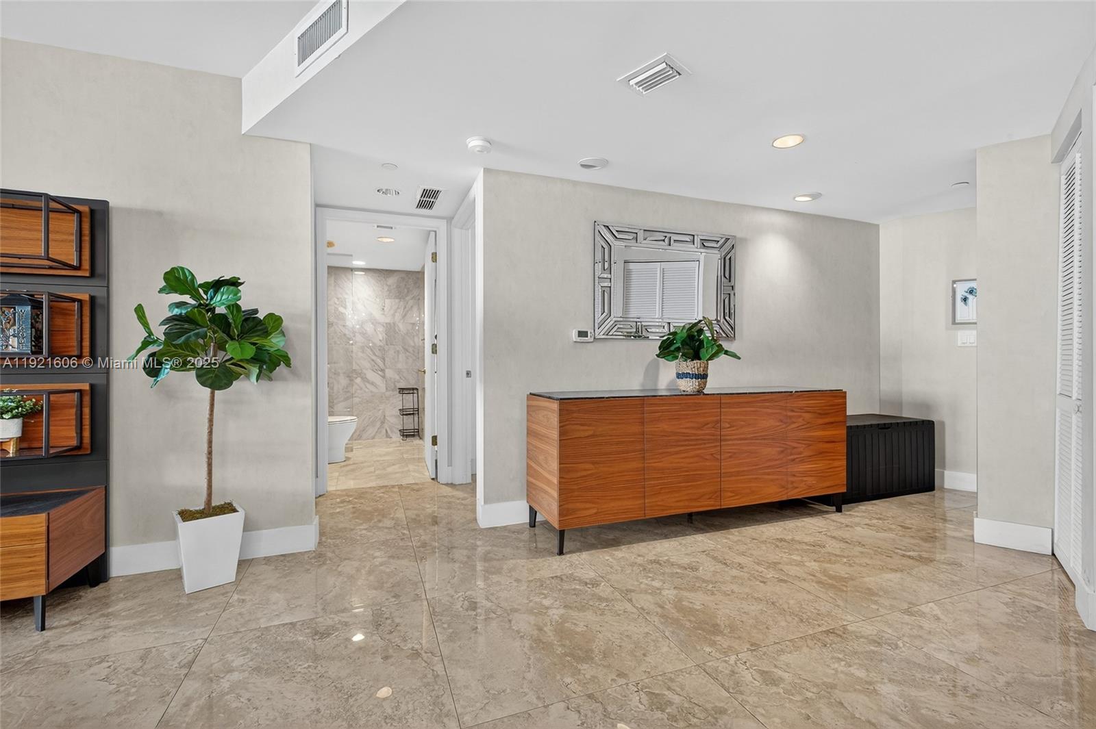 9821 East Bay Harbor Drive, Unit 402 Bay Harbor Islands, FL 33154 - Photo 20 of 34 a view of a room with window and cabinet