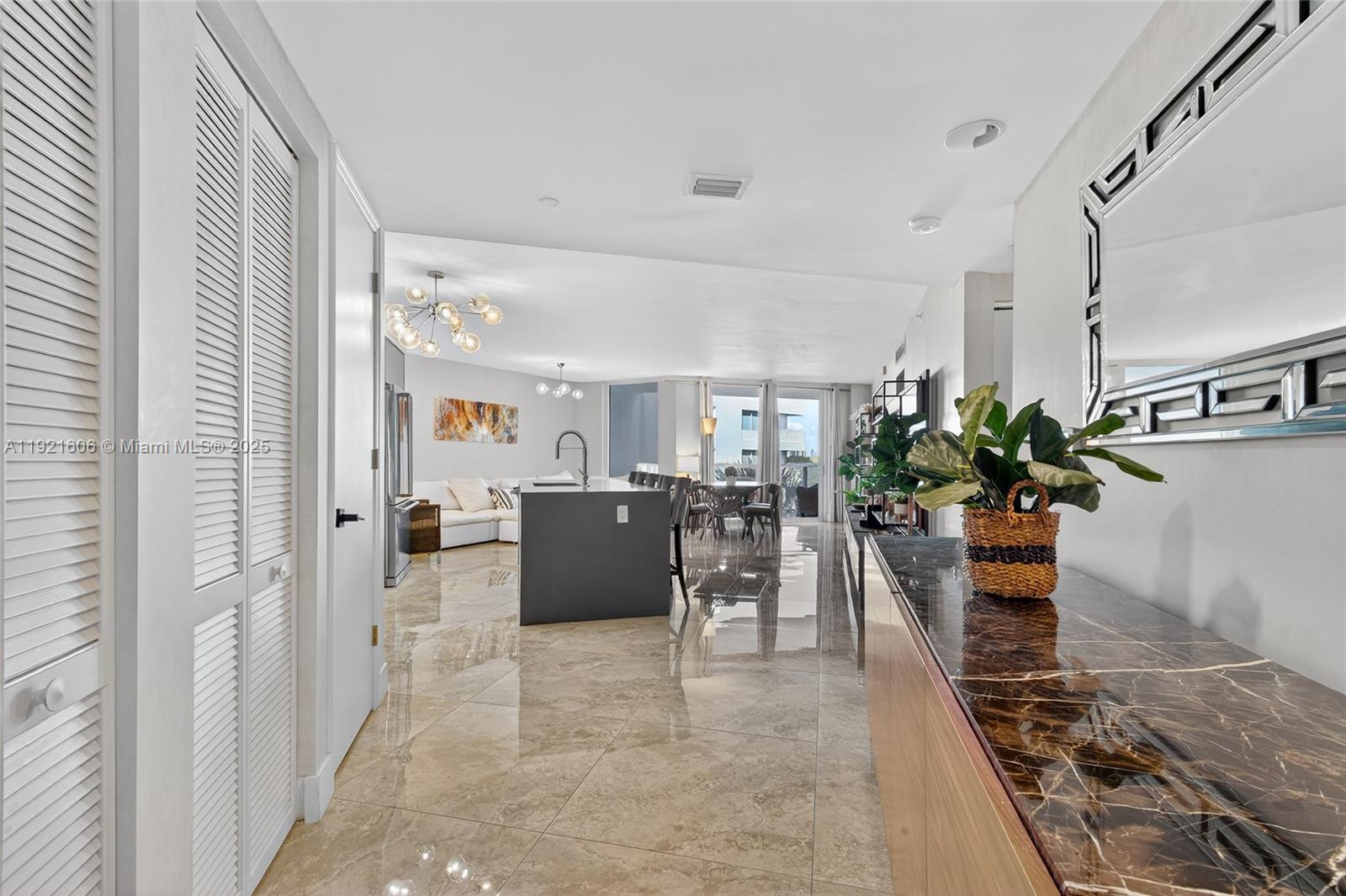 9821 East Bay Harbor Drive, Unit 402 Bay Harbor Islands, FL 33154 - Photo 2 of 34 a view of a workspace with furniture