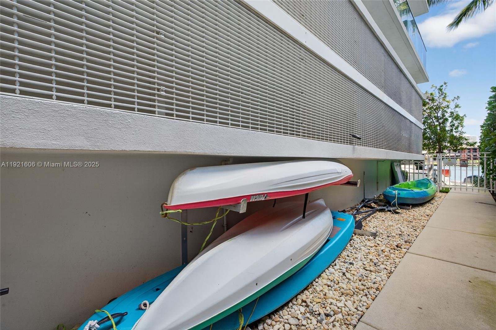 9821 East Bay Harbor Drive, Unit 402 Bay Harbor Islands, FL 33154 - Photo 30 of 34 a backyard of a house with outdoor seating