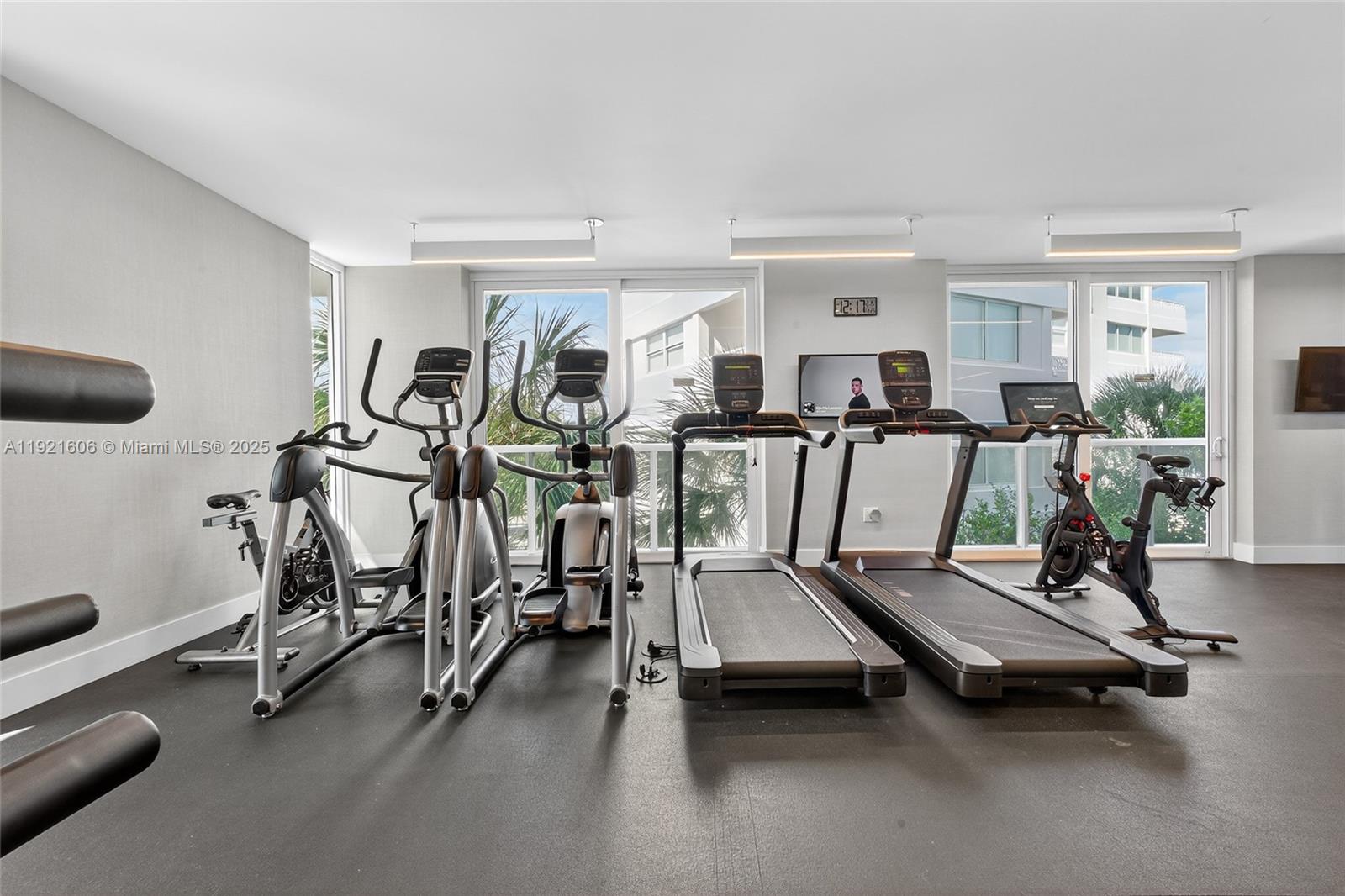 9821 East Bay Harbor Drive, Unit 402 Bay Harbor Islands, FL 33154 - Photo 31 of 34 a view of a room with gym equipment
