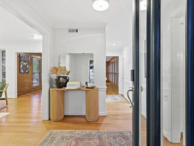 a living room with furniture and view of living room