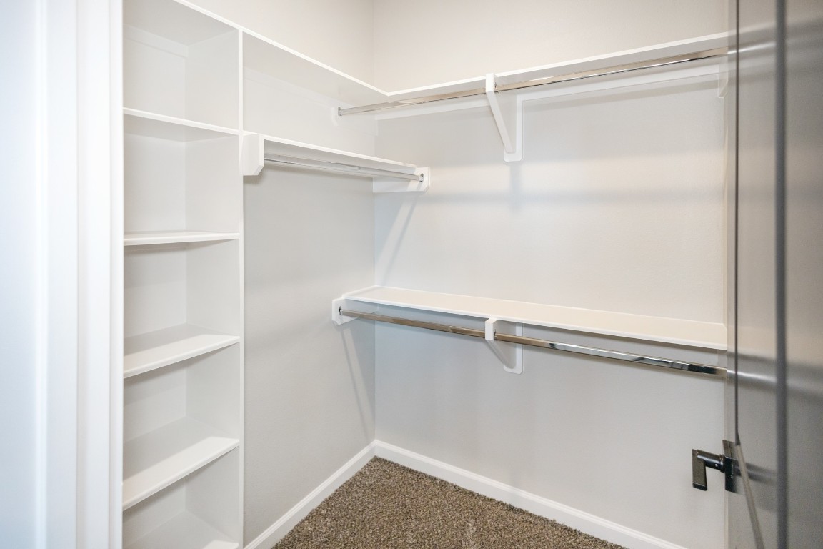 5036 Mallow Street, Unit B Houston, TX 77033 - Photo 27 of 36 a view of an empty walk in closet