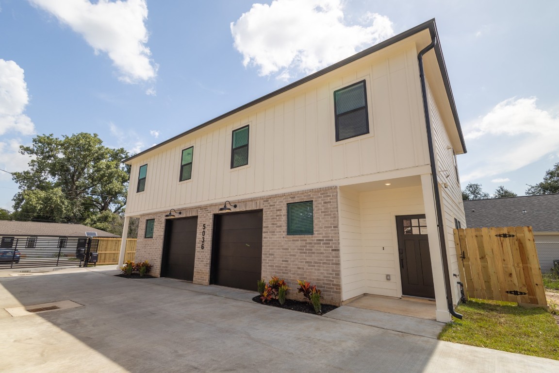 5036 Mallow Street, Unit B Houston, TX 77033 - Photo 3 of 36 a house view with a backyard space