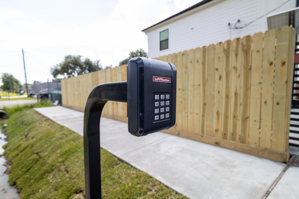 5036 Mallow Street, Unit B Houston, TX 77033 - Photo 7 of 36 a view of a wooden fence in backyard