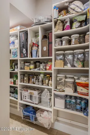 a view of a patio with chairs and tables