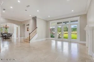 a bathroom with a granite countertop sink a mirror and a shower