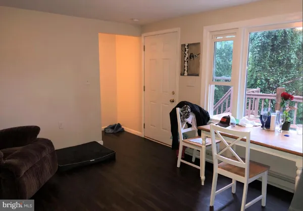 a workspace with furniture and window