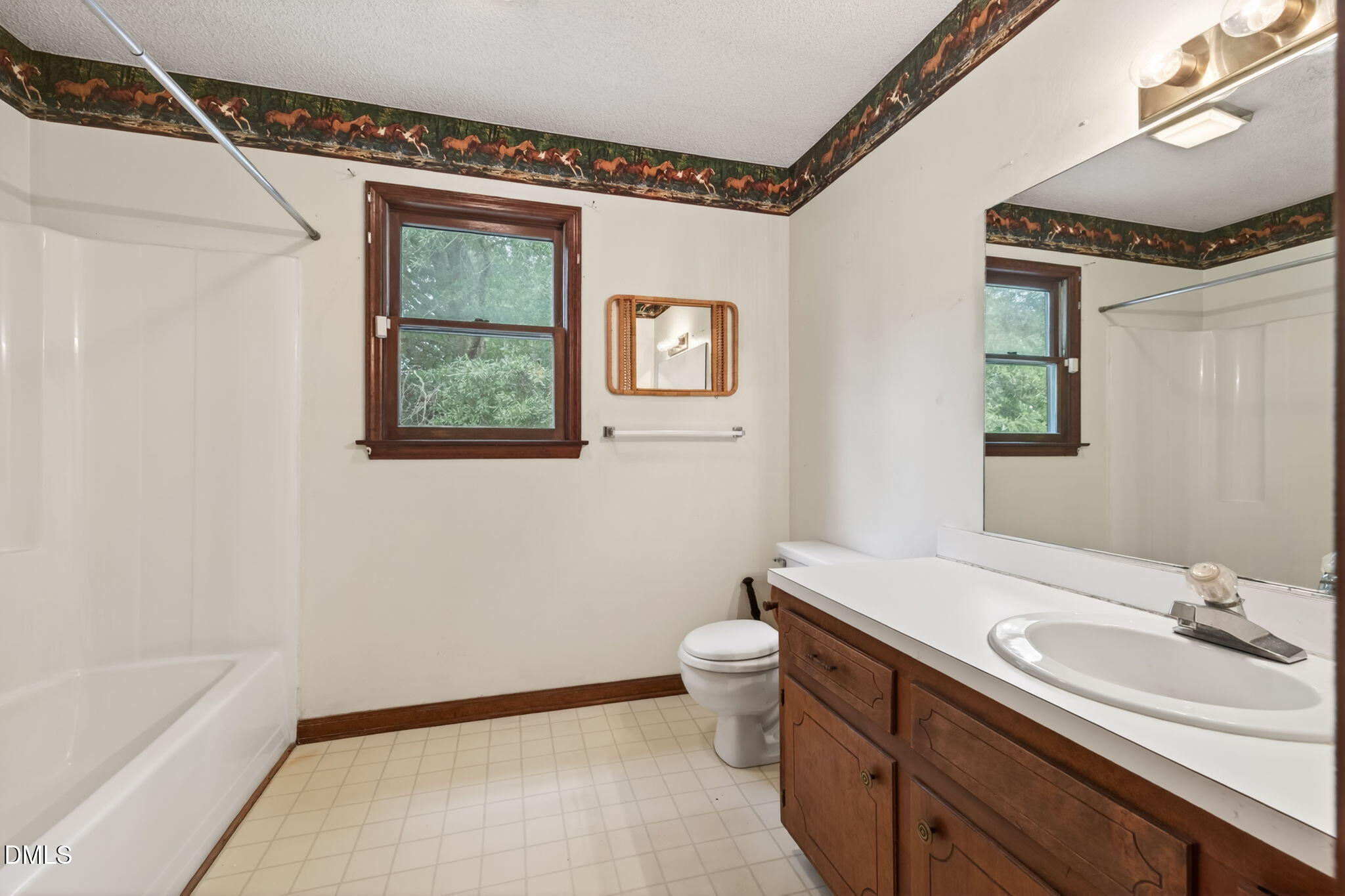 350 Grantham School Road Goldsboro, NC 27530 - Photo 21 of 49 a bathroom with a sink a toilet and shower