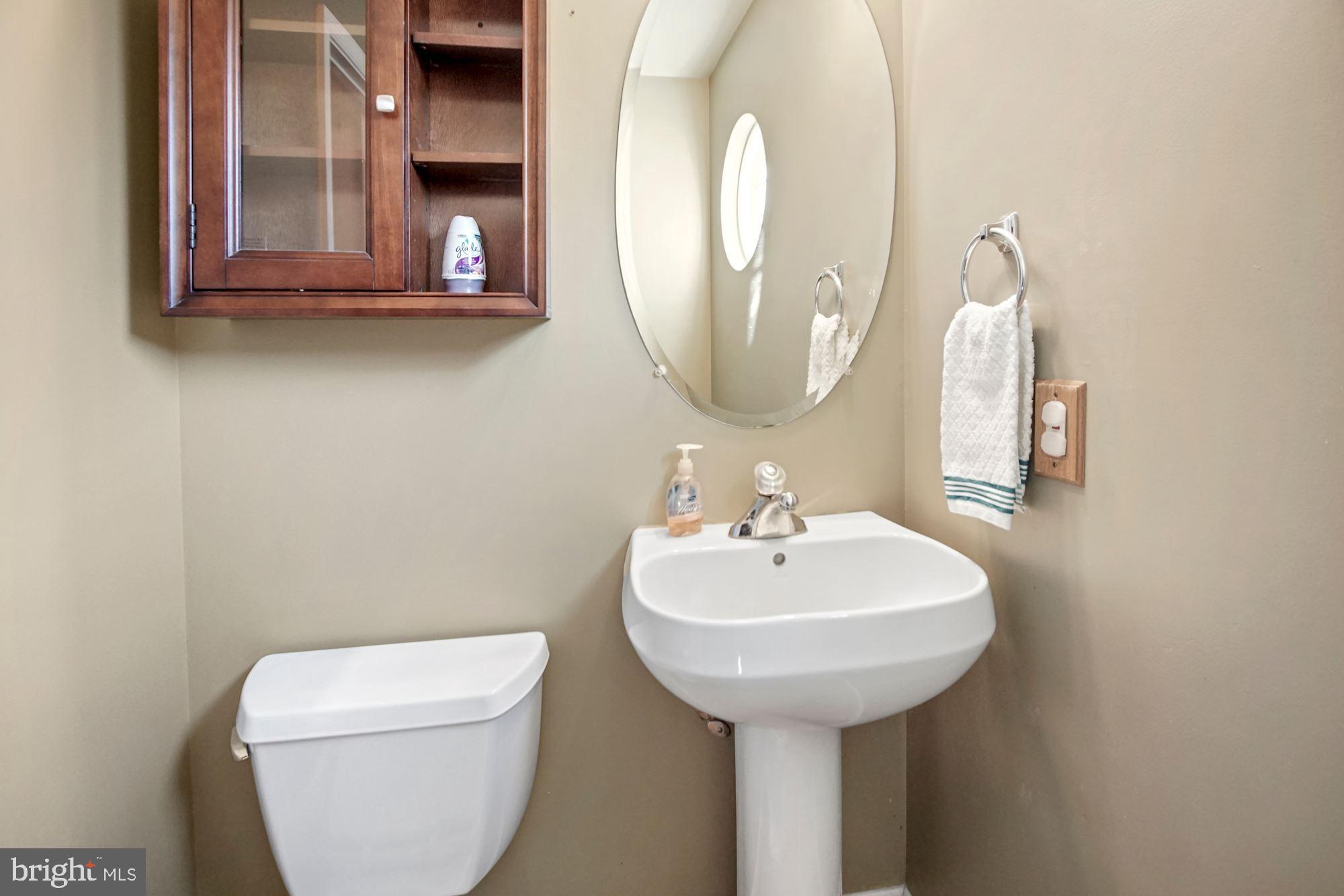 1731 Lottie Fowler Road Prince Frederick, MD 20678 - Photo 14 of 41 Half bath on main level off of kitchen and garage